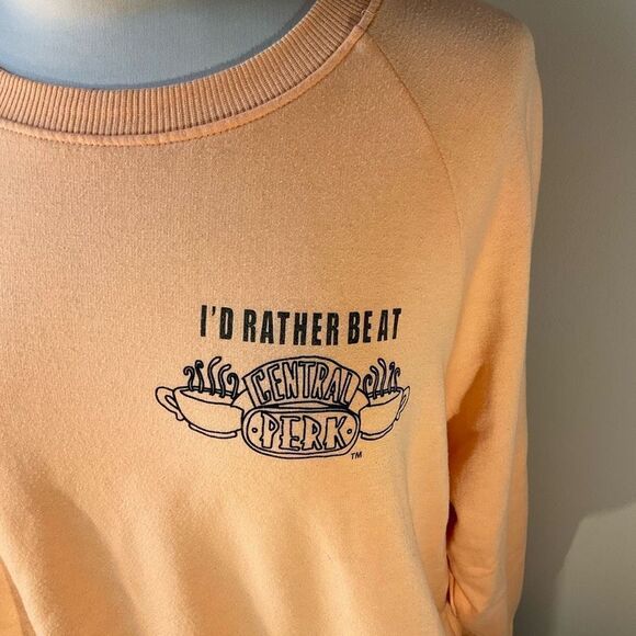 Friends Cropped Dolman Sleeve Central Perk Sweatshirt. Peach, Medium - Picture 7 of 9